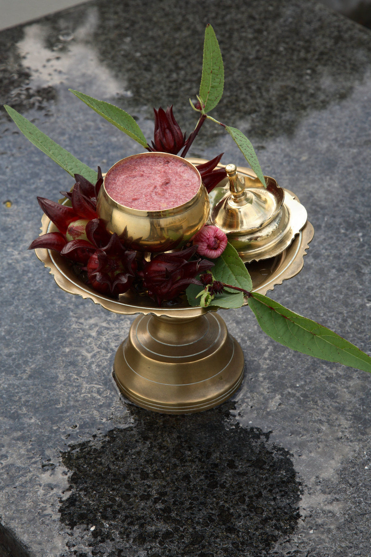 Tanjong Jara Resort, Terengganu - A Small Luxury Hotels Of The World Dungun Bagian luar foto A brass thali with a bell, flowers and a pot of halwa